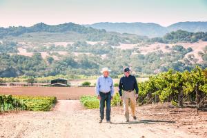 Royce Lewellen, Louis Lucas, Mike Lewellen in the Valley View Vineyard