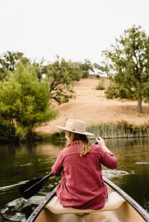 Girl on lake at Alisal Ranch lake for Winter Wine Roundup